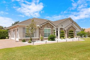 Real estate photography of the front exterior at 5351 N Sterling Ranch Circle, Davie, FL
