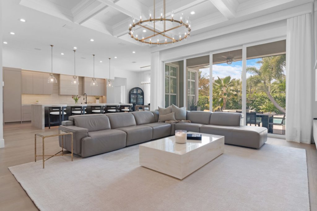 HD real estate photography of the living room at 5351 N Sterling Ranch Circle, Davie, FL