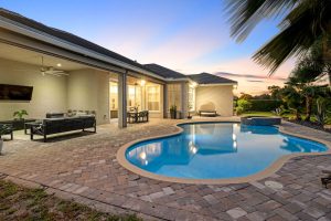 Twilight real estate photography of the pool at 5351 N Sterling Ranch Circle, Davie, FL