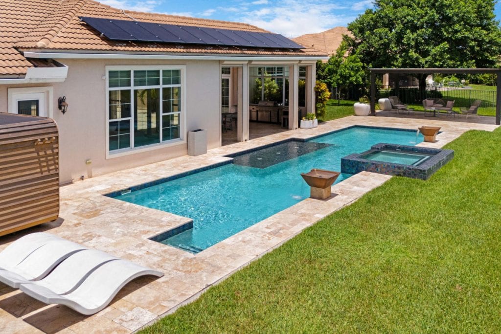 HD real estate photography of the pool at 5630 N Sterling Ranch Drive, Davie, FL