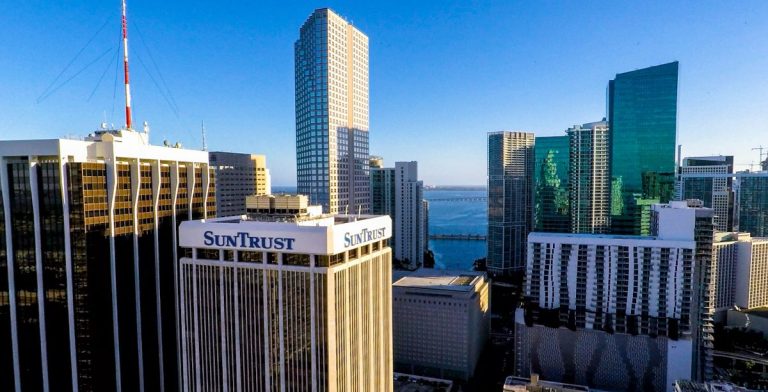 South Florida commercial buildings and city skyline viewed from above.