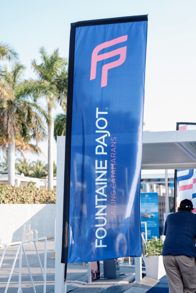 Fountaine Pajot sailing catamarans promotional banner at Miami Boat Show.
