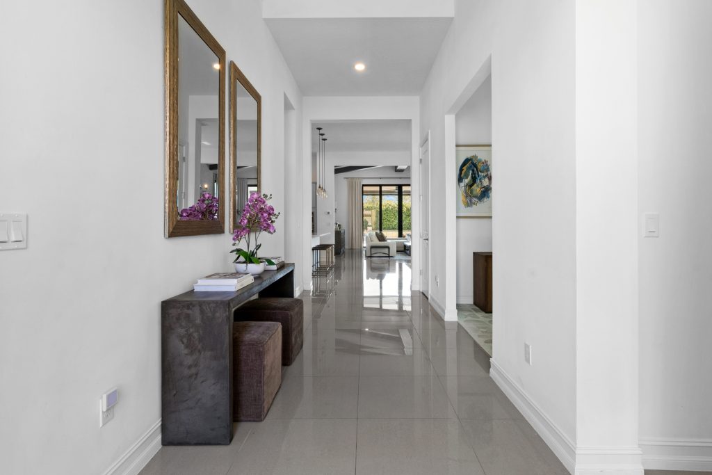 Bright, modern home interior with white walls and elegant decor.
