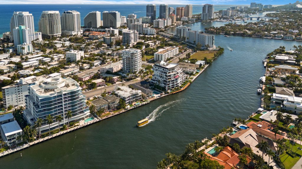 Aerial view of Fort Lauderdale with high-rise buildings and waterway.
