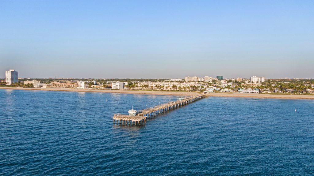 Scenic view of Pompano Beach pier extending into the Atlantic Ocean.